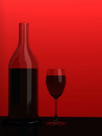 Bottle and red wine glass on a colour backgroundの写真素材