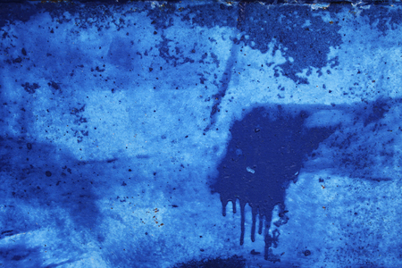 Textures on the blue wall, for background. Grungy blue concrete wall background.の写真素材