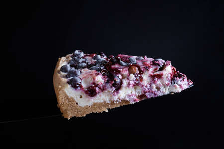 Berry pie cake from the cherries currants in a bowl of fresh steam a whole and slices of hot...