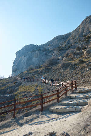 stairs with railings in the mountains, wild landscape, trail to the mountains, tourist route
