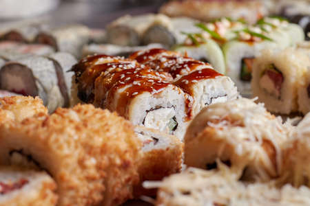 sushi set on the table, macro, close-up, various sushi and rolls, food, asian cuisineの写真素材