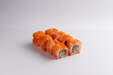 a portion of rolls on a stand, japanese food, sushi on the table, chinese chopsticks, light backgroundの写真素材