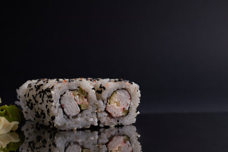 a portion of rolls on a stand, japanese food, sushi on the table, chinese chopsticks, light backgroundの写真素材