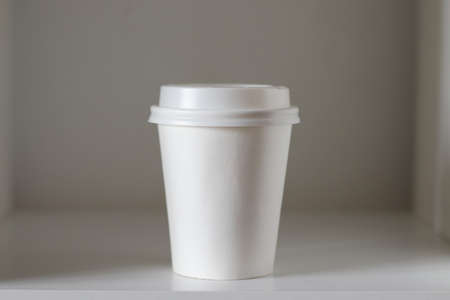 coffee cup on the shelf, mockup, own design,, close-upの写真素材