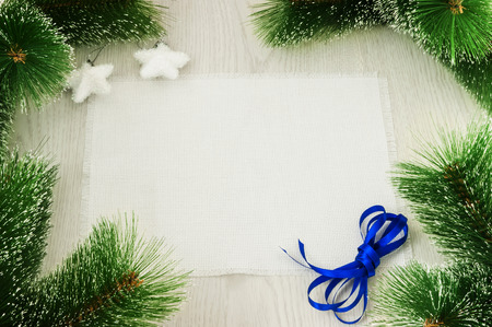 Christmas card with decoration on a wooden board with copy space の写真素材