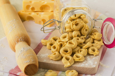 Italian traditional raw tortellini with cheese for cooking.Selective focus.の写真素材