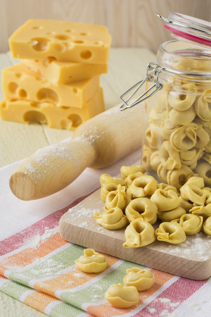 Italian traditional raw tortellini with cheese for cooking.Selective focus.の写真素材