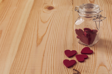 Valentine\'s day card with heart on wooden background.の写真素材