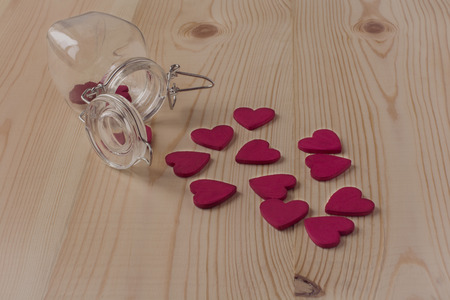 Valentine\'s day card with heart on wooden background.の写真素材