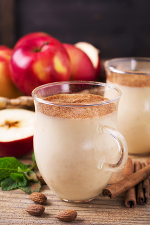 Apple Banana Cinnamon Smoothie in glass. Selective focus.の写真素材