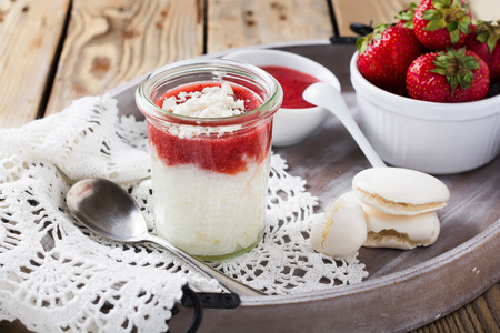 Strawberry rice pudding served in jar. Healthy breakfast. Selective focus.の写真素材
