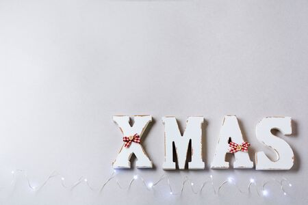 Christmas composition with letters XMAS decoration on gray background. Top view.の写真素材