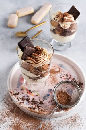 Homemade Italian dessert tiramisu with savoiardi and mascarpone,