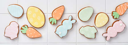 Easter baking background. Concept of cooking traditional festive food Easter gingerbread and bread...