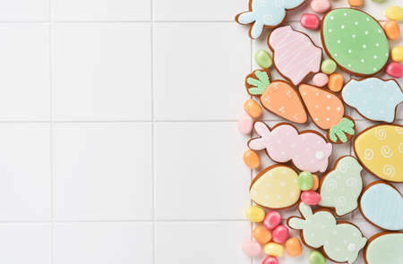 Easter baking background. Concept of cooking traditional festive food Easter gingerbread and bread...