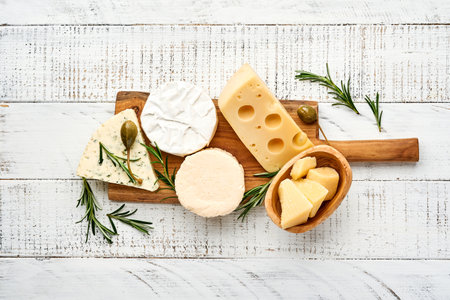 Set or assortment cheeses. Suluguni with spice, camembert, blue cheese, parmesan, maasdam, brie...