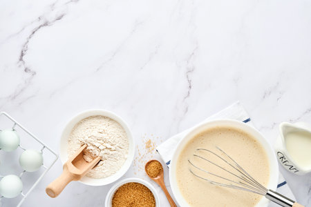 Preparation of dough for home pancakes for Breakfast or for Maslenitsa. Ingredients on the table -...