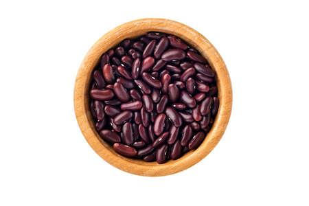 Raw red beans in bamboo bowl isolated on white background. Diet for weight loss and fight against...