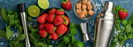 Food fresh ingredients for making lemonade, infused detox water or cocktail. Strawberries, lime,...