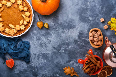 Pumpkin Pie. Tart with whipped cream and cinnamon on rustic background. Traditional american homemade pumpkin cake for Thanksgiving or Halloween Ready to eat. Mock up.の写真素材