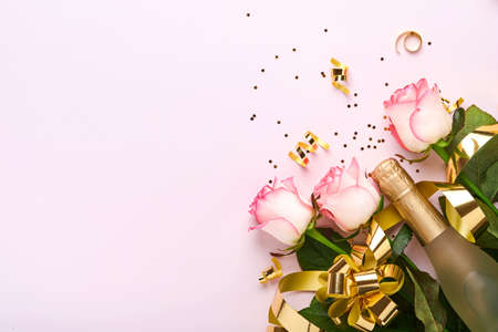 Alexander cocktail in cocktail glass on wooden table with shaker, nutmeg and small grater with Christmas decor on dark background. Beverage photography. Festive cocktail drink.の写真素材