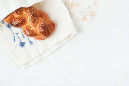 Challah bread. Sabbath kiddush ceremony composition. Freshly baked homemade braided challah bread...