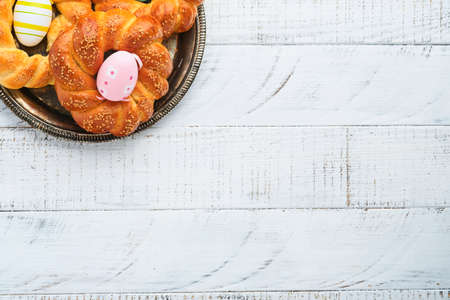 Spanish Easter cake. Traditional mona de pascua typical in Spain with boiled eggs eaten inside on...
