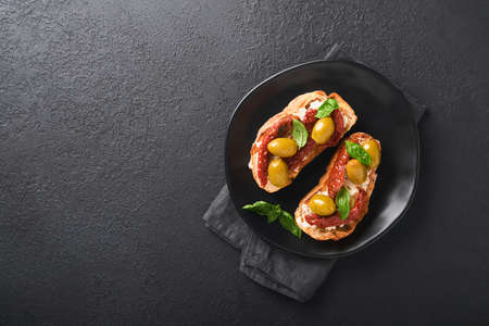 Bruschetta with dried sun tomatoes. Toast or sandwich with ricotta, sun dried tomatoes and Provence...