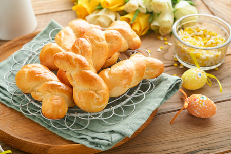 Easter breakfast Holliday concept. Easter bunny buns rolls with cinnamon made from yeast dough with...