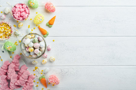 Sweet Easter concept. Sweet Easter kids holiday assortment marshmallows rabbit, chocolates easter...