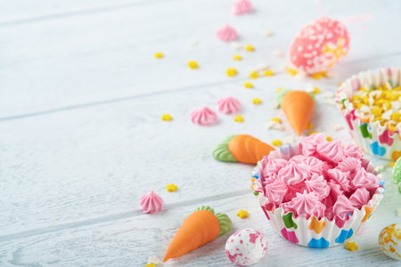 Sweet Easter concept. Sweet Easter kids holiday assortment marshmallows rabbit, chocolates easter...
