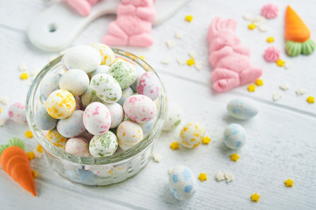 Sweet Easter concept. Sweet Easter kids holiday assortment marshmallows rabbit, chocolates easter...