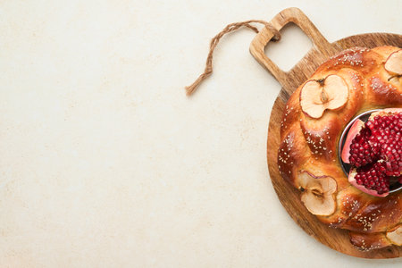 Jewish Holidays - Rosh Hashanah or Rosh Hashanah. Pomegranate, apples, honey and round challah on...