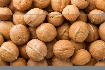Walnut nuts texture. Food background. Top view. Close up.