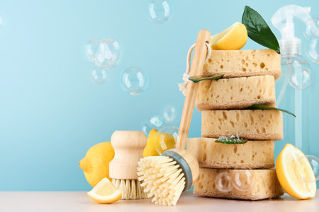 Eco friendly cleaning tools, household cleaning scrub sponges, spray bottle, lemon, wooden...
