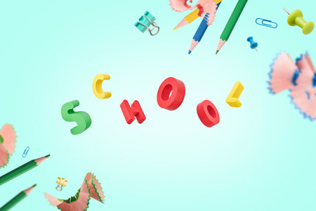 Back to school background with flying pencil shavings, wooden letters and various school supplies on...