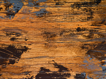 Old grunge dark textured wooden background with scratches and black paint stains. Top view teak wood paneling. Design Element.の写真素材