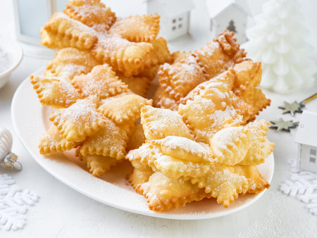Christmas Cookies Snowflakes layer from unleavened dough in powdered sugar. Idea for Christmas baking. Christmas and New Year dessert and decoration idea for holidays for children and adults.の写真素材