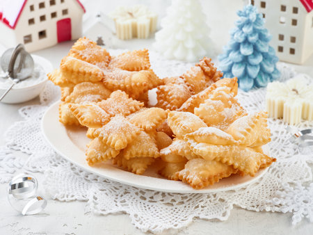 Christmas Cookies Snowflakes layer from unleavened dough in powdered sugar. Idea for Christmas baking. Christmas and New Year dessert and decoration idea for holidays for children and adults.の写真素材