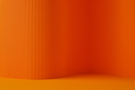 Minimal abstract orange background for product presentation. Soft shadow and light, connection of horizontal and vertical lines, bending of material. Element for design.の写真素材