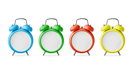 Set of alarm clocks red, blue, green, yellow color without hands and dial with empty space for design isolated on white background with clipping path. Design element.の写真素材
