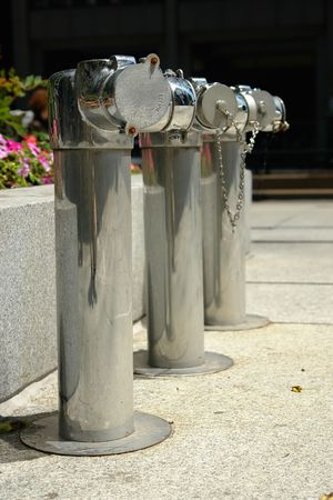 three water hydrants downtownの写真素材