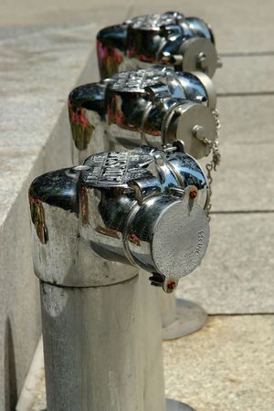 three water hydrants downtownの写真素材
