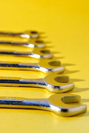 Wrench tools on yellowの写真素材