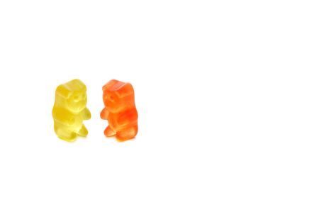 Two of colorfoul gummy bears on white backgroundの写真素材