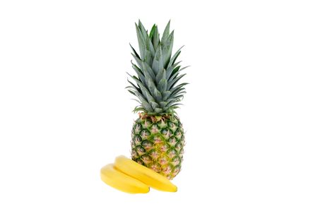 Bananas and pineaple isolated on the white background.の写真素材