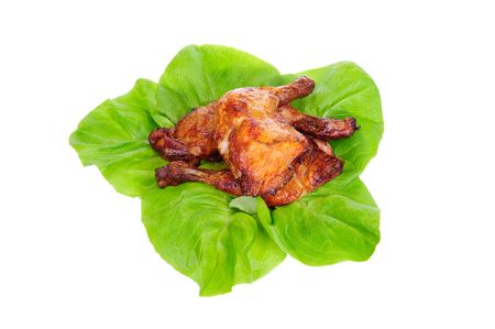 Baked chicken on the lettuce leaf.の写真素材