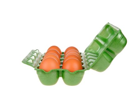 Eggs in the green basket isolated on the white background.