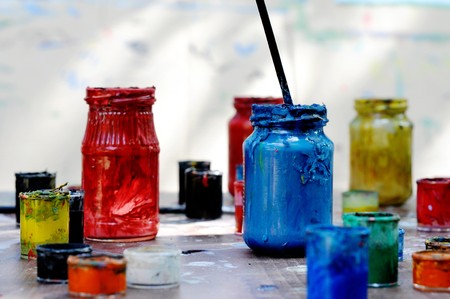 Jars with colourful paints. Closeup.の写真素材