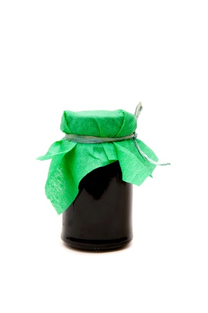 Jar of blueberry jam on white background.の写真素材